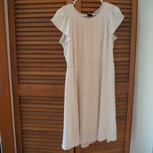 Chic and sophisticated Nude color dress